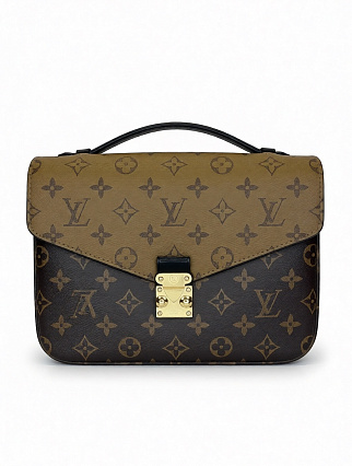 Сумка-кроссбоди Louis Vuitton из монограммного холста с черной кожаной отделкой фото